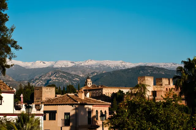 The Alhambra in front of the snow-capped Sierra Nevada