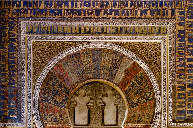 Gold mosaic arch of the mihrab in the Mezquita of Córdoba
